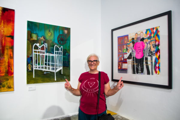 Chelle Destefano in front of her artwork at the Ignite 2019 exhibition launch.