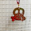 A red skull pendant