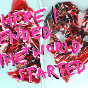 Where I ended the world started in pink text over a photo of two red hearts made from scrunched paper.