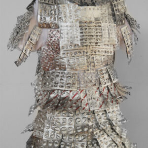 A suit of armour on a mannequin made from pill packets.