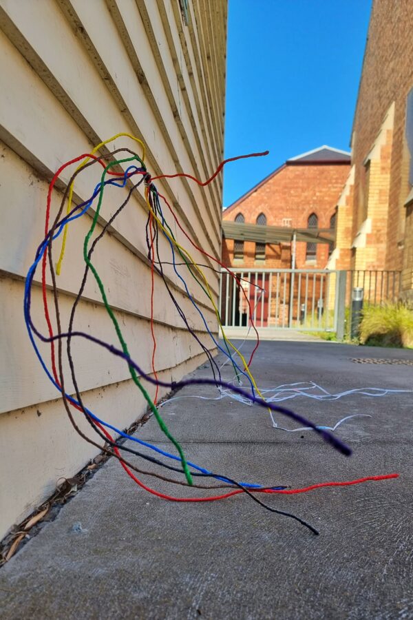 8 strands of wire with each painted a different colour of the rainbow.