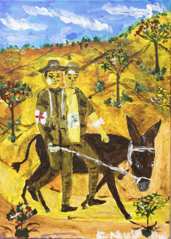 Two servicemen in khaki army uniforms and wide-brimmed hats walk with a brown donkey. The injured serviceman is covered in bandages and is sitting on the donkey's back while Simpson, the medic, walks alongside. Simpson has a white sleeve with a red cross on his arm. He leads the donkey with a white rope through a dry, yellow landscape.