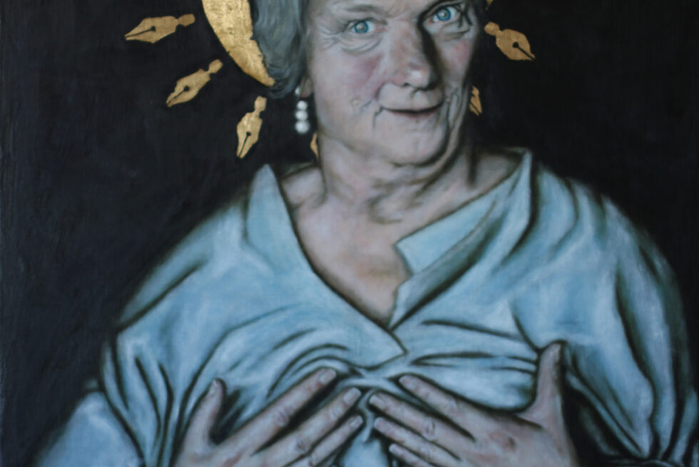 A painted portrait of a seated 75 year old anglo British woman from the waist up. She is pressing on her breasts, with the blue folds of clothing bunched up around her hands. She stares at the viewer with her head slightly tilted and turned. There is a gold halo over her head with spikes of large gold pen nibs surrounding her head. The painting has a plain dark background.