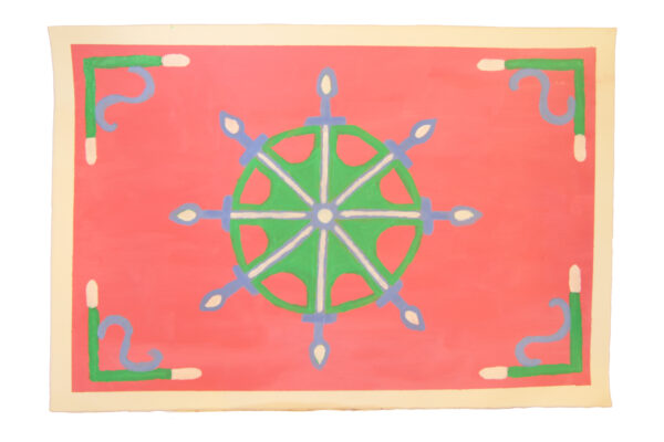 A pink background with a green, blue and white wheel shaped like a spider’s web with 8 fairy lights around the wheel. On each corner is an L shaped pattern making a border around the web wheel.