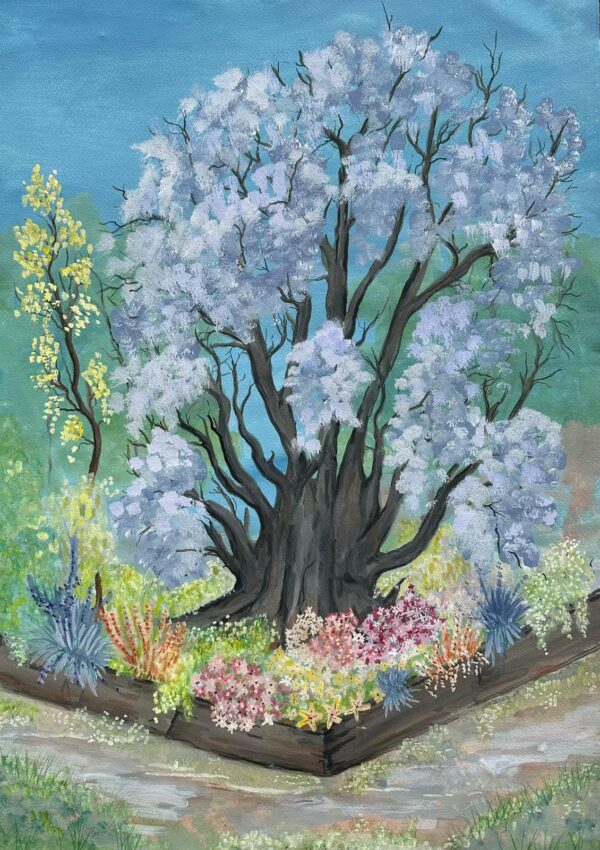 Old blossum tree and colourful garden in Spring