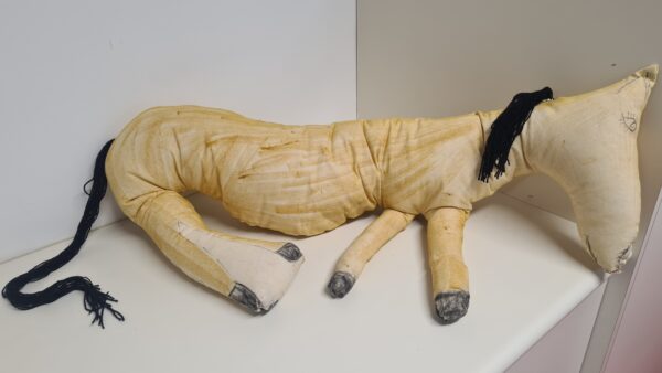 A soft sculpture of a horse