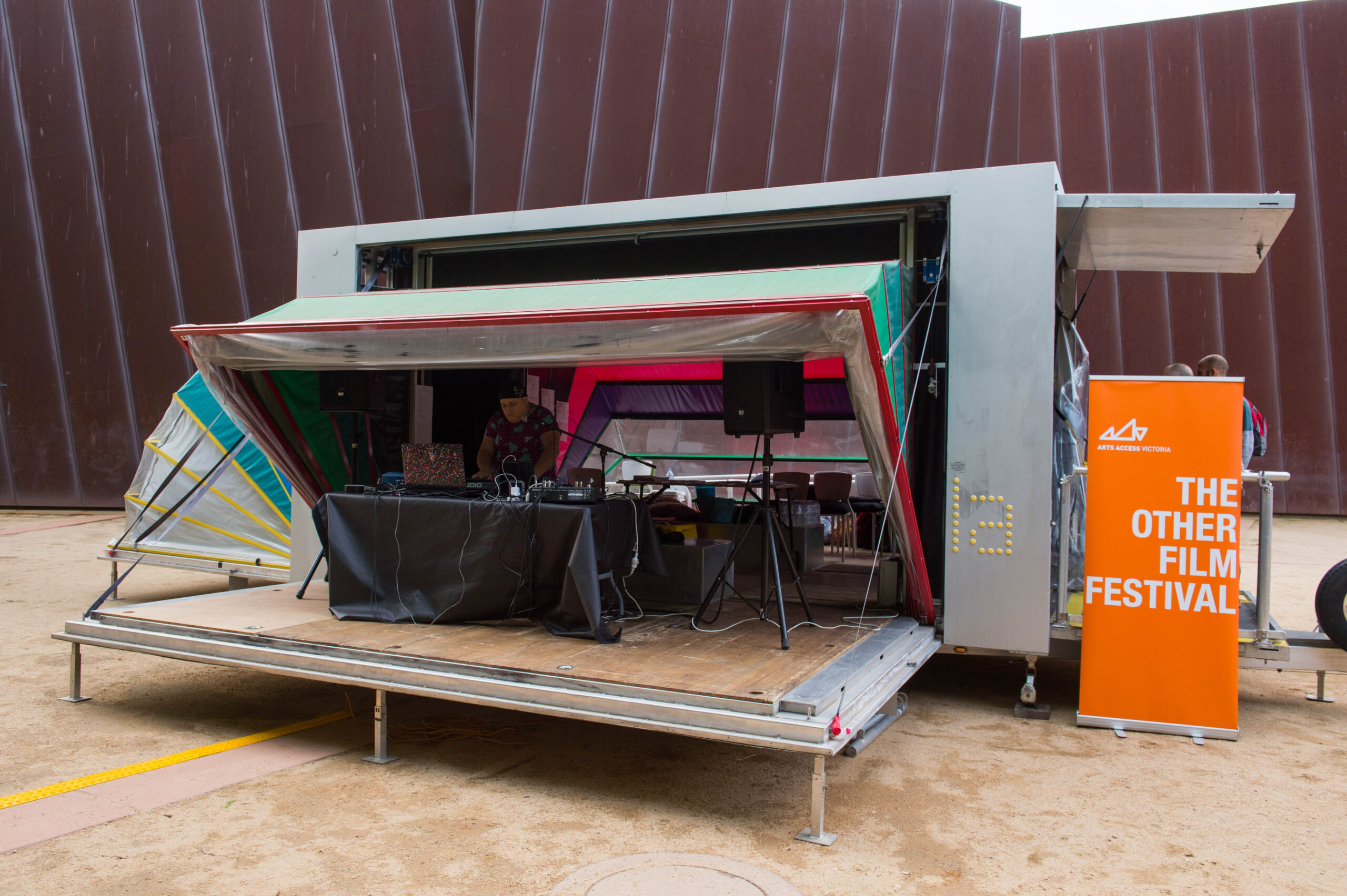 A portable art station and a TOFF banner.