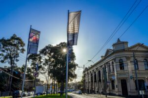 flags in front of the meat market