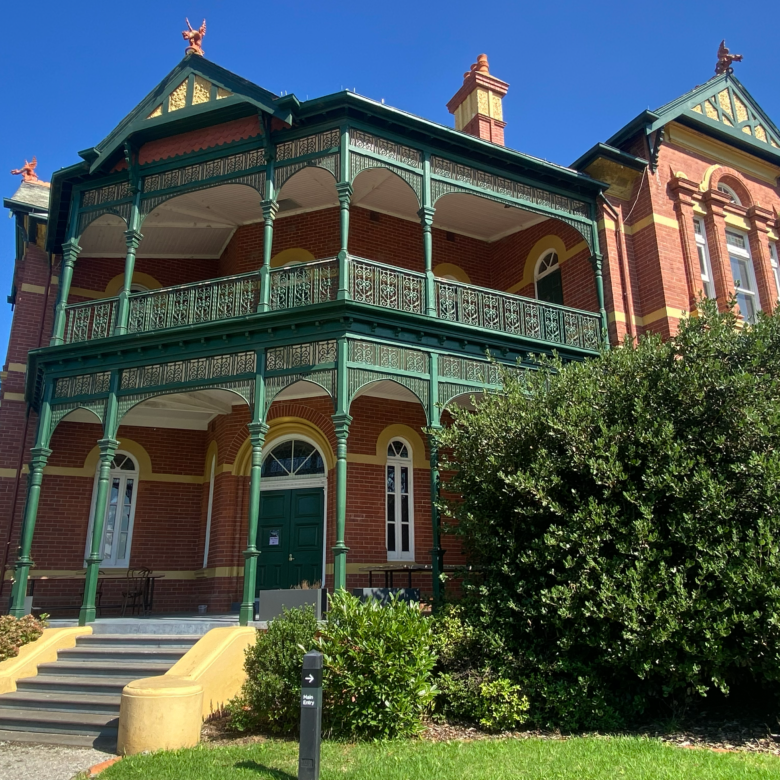 Outside of Bundoora Homestead Art Centre 2-story building
